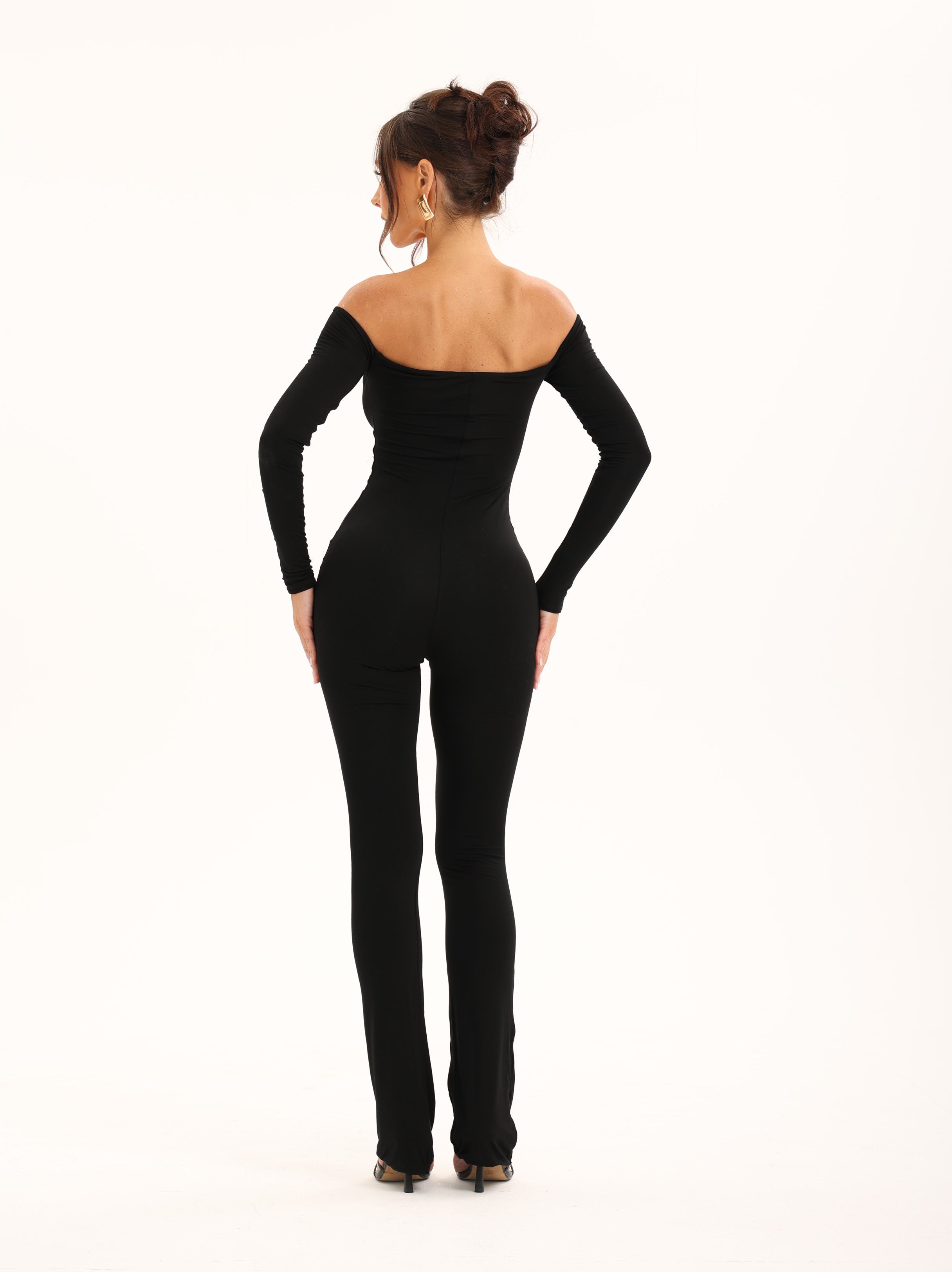 OFF SHOULDER JUMPSUIT IN BLACK